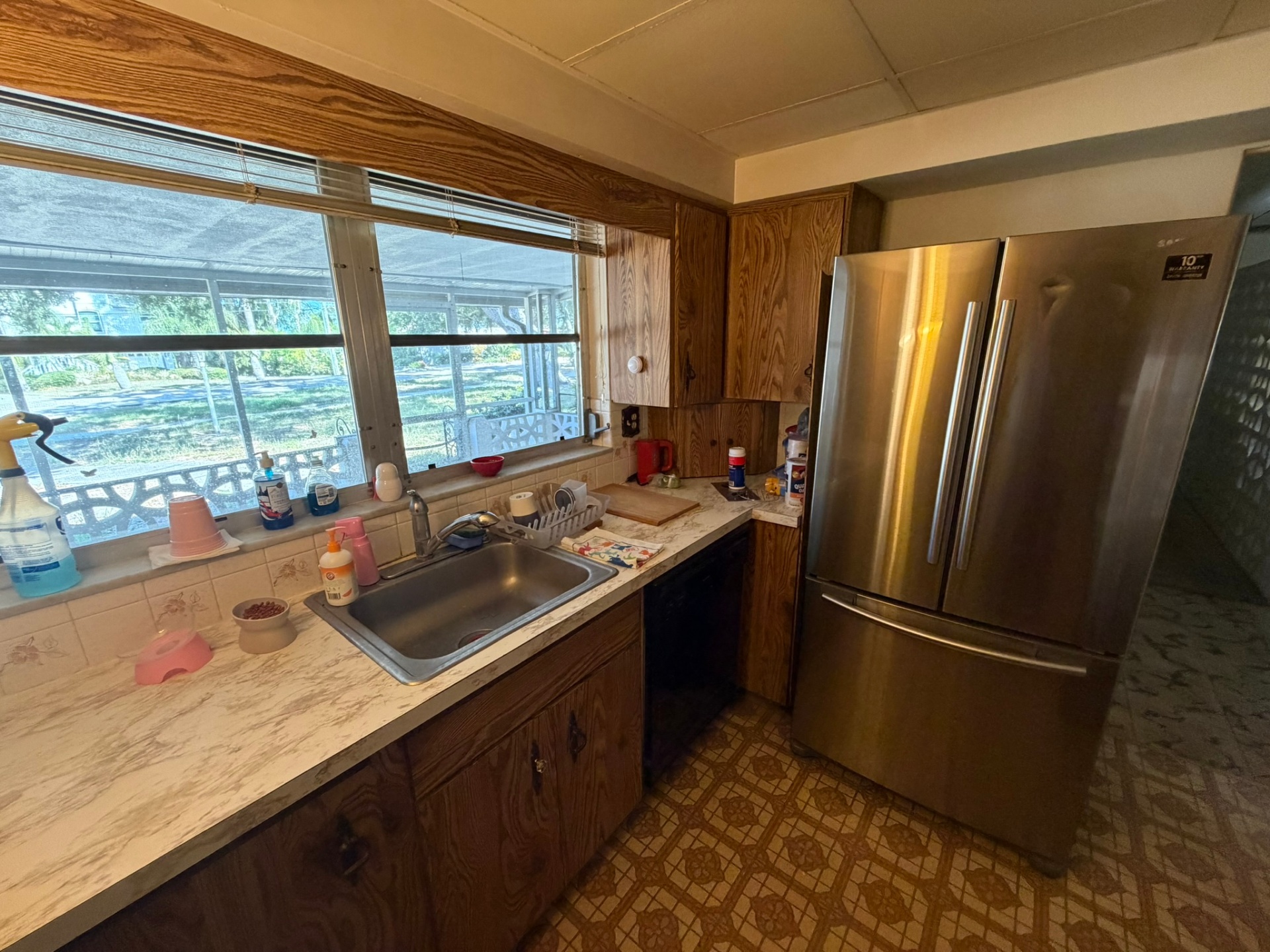 Kitchen โ sink & window view โ Palma Sola off-market listing photo 25