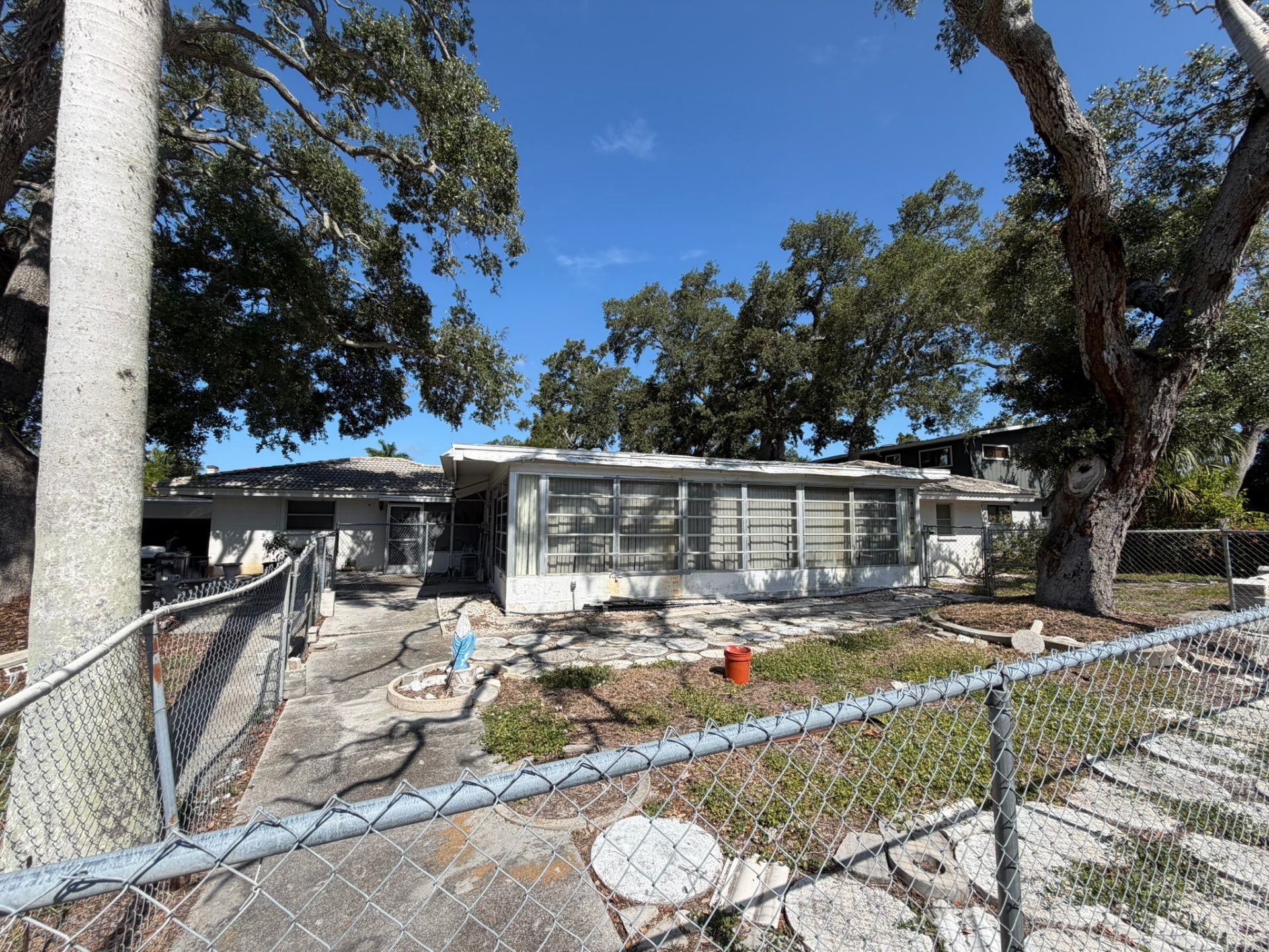 Rear elevation with Florida room โ Palma Sola off-market listing photo 42